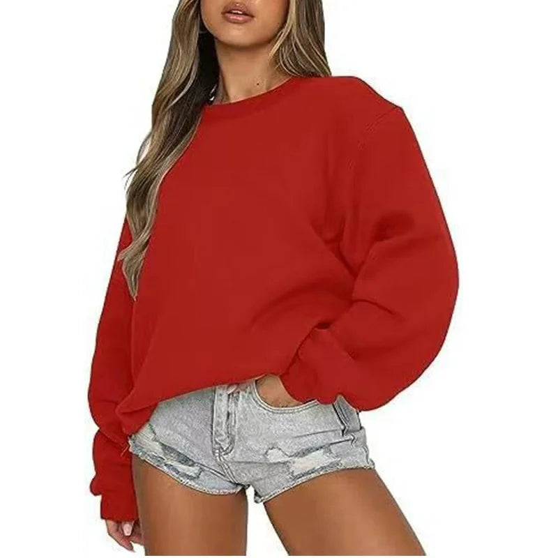 Red sweatshirt worn by a person on a white background