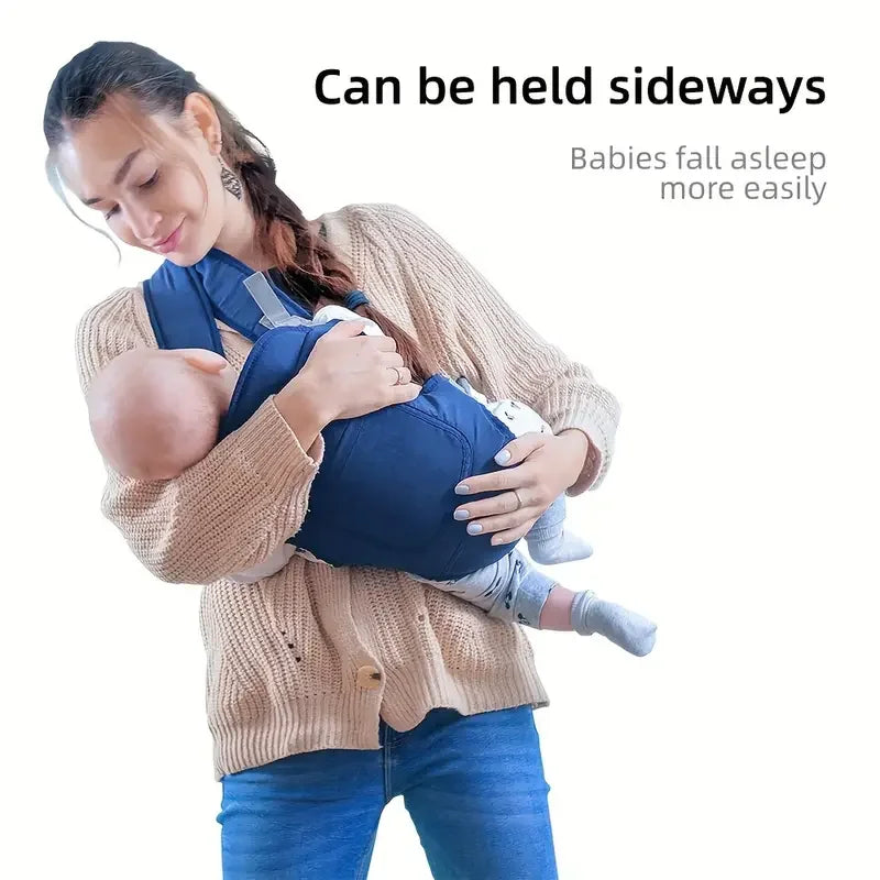 Woman holding a baby in a blue carrier with text indicating the carrier can be held sideways and babies fall asleep more easily.