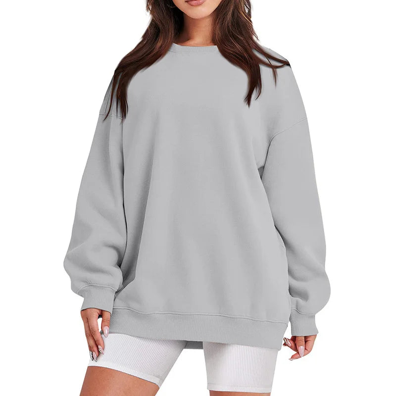 Gray sweatshirt worn by a person on a white background