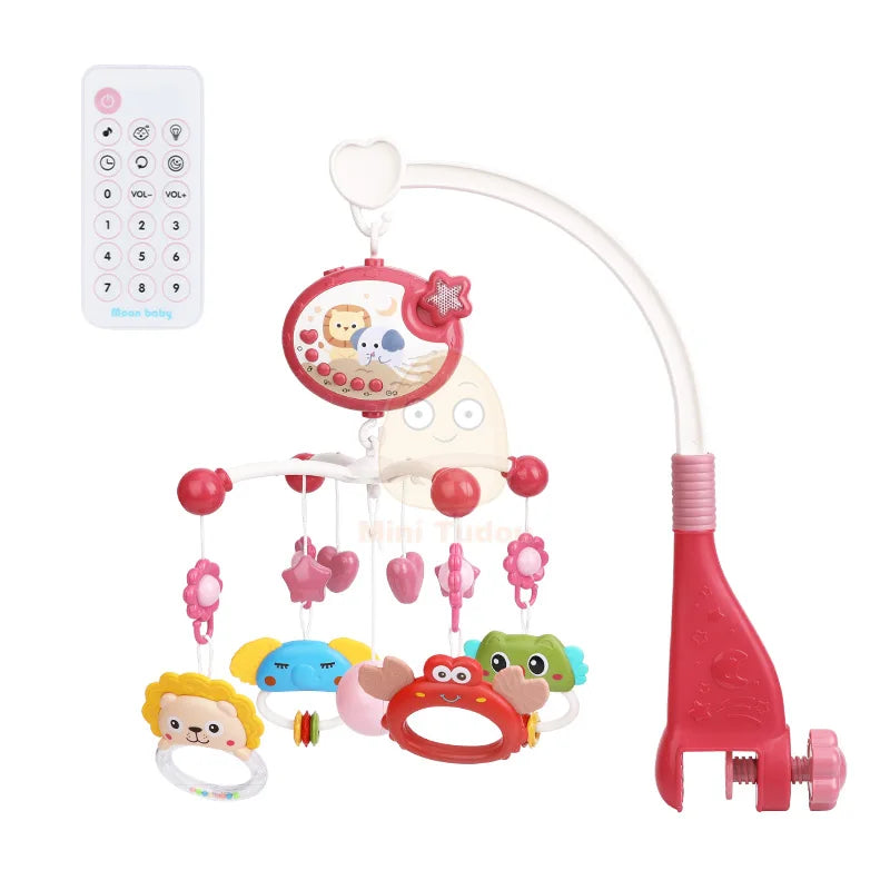 Baby mobile with colorful toys and a remote control on a white background