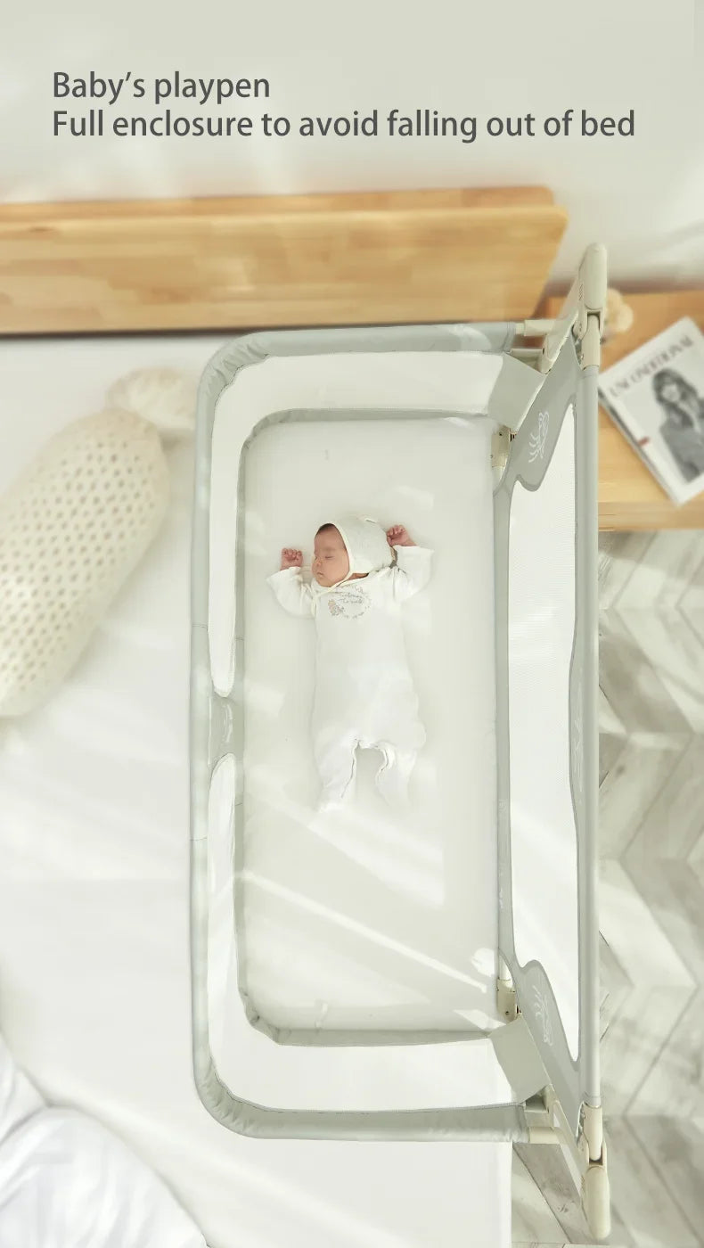 Baby's playpen with a full enclosure on a bed