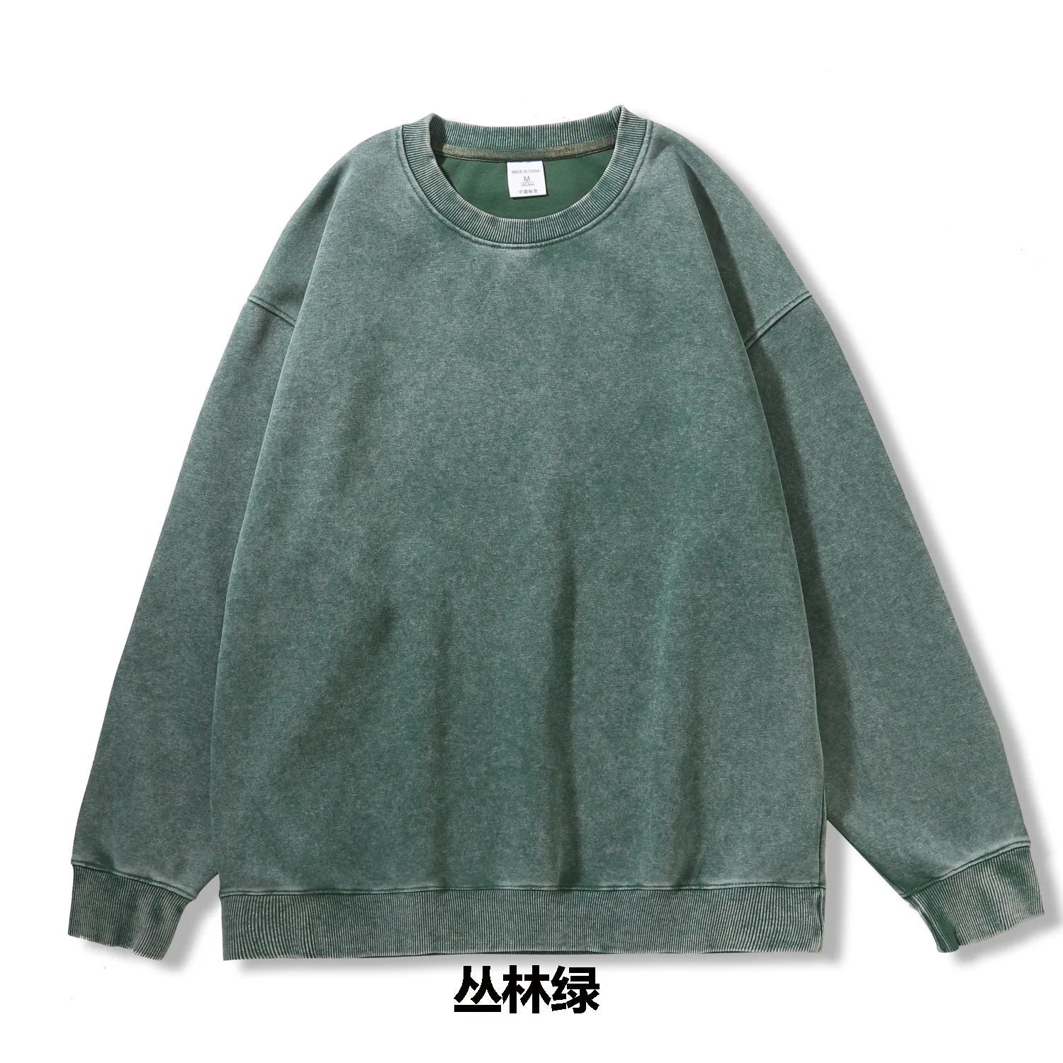 Green sweatshirt on a white background