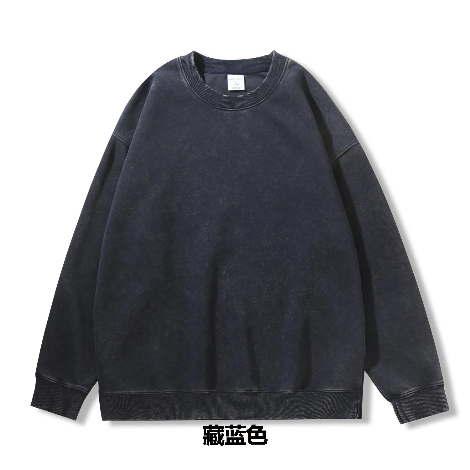 Navy blue sweatshirt on a light gray background
