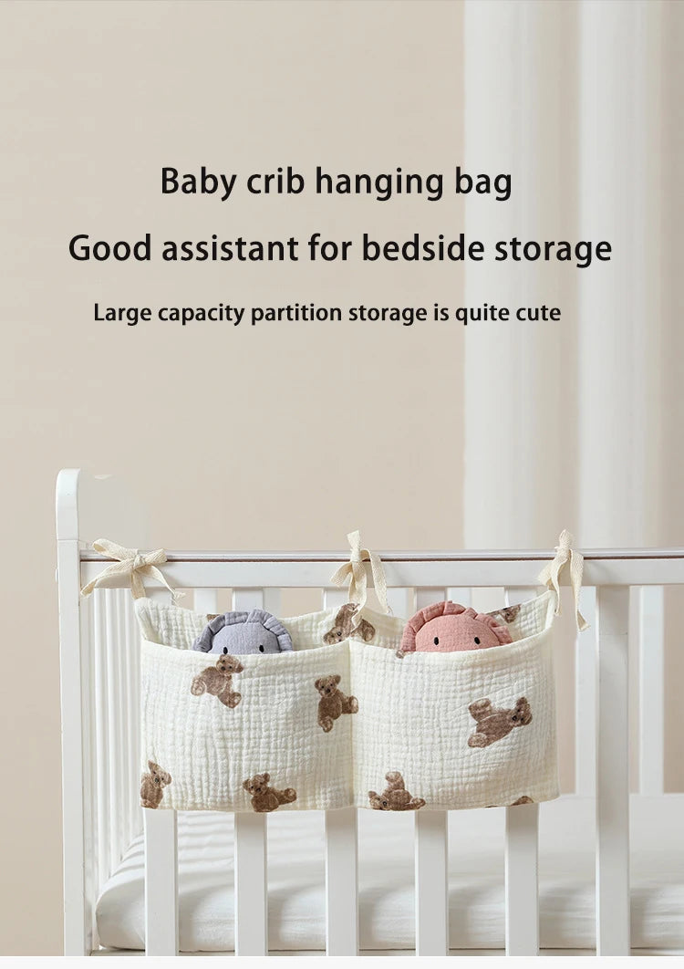 Baby crib hanging bag with teddy bear design attached to a crib, text describing its use for bedside storage.