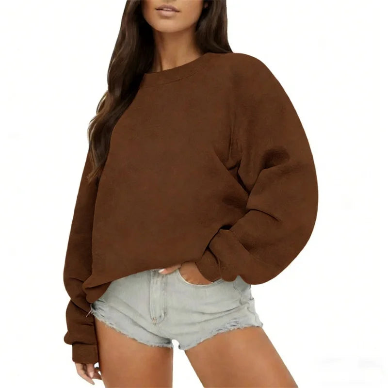 Brown sweatshirt worn by a person on a white background