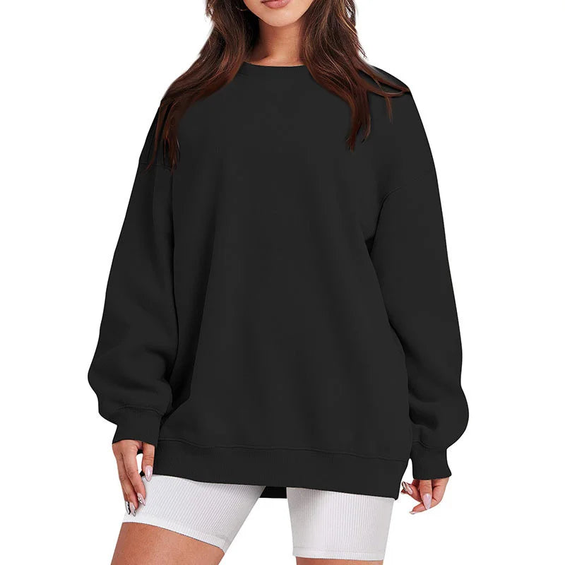 Black sweatshirt worn by a person on a white background