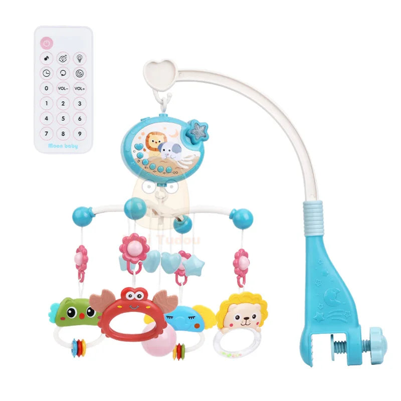 Baby mobile toy with various hanging charms and a remote control on a white background