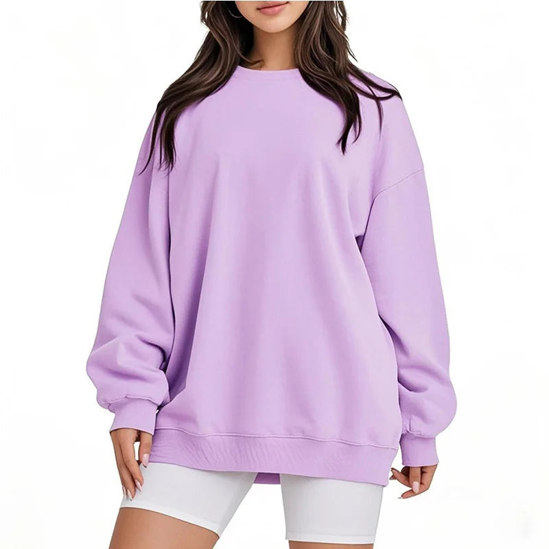 Person wearing a light purple sweatshirt on a white background