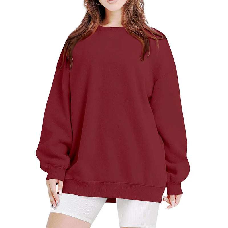 Maroon sweatshirt worn by a person on a white background