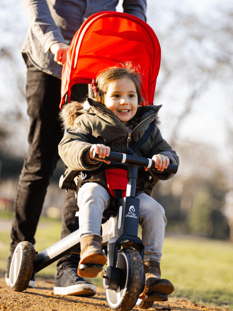 happy kid on the trike